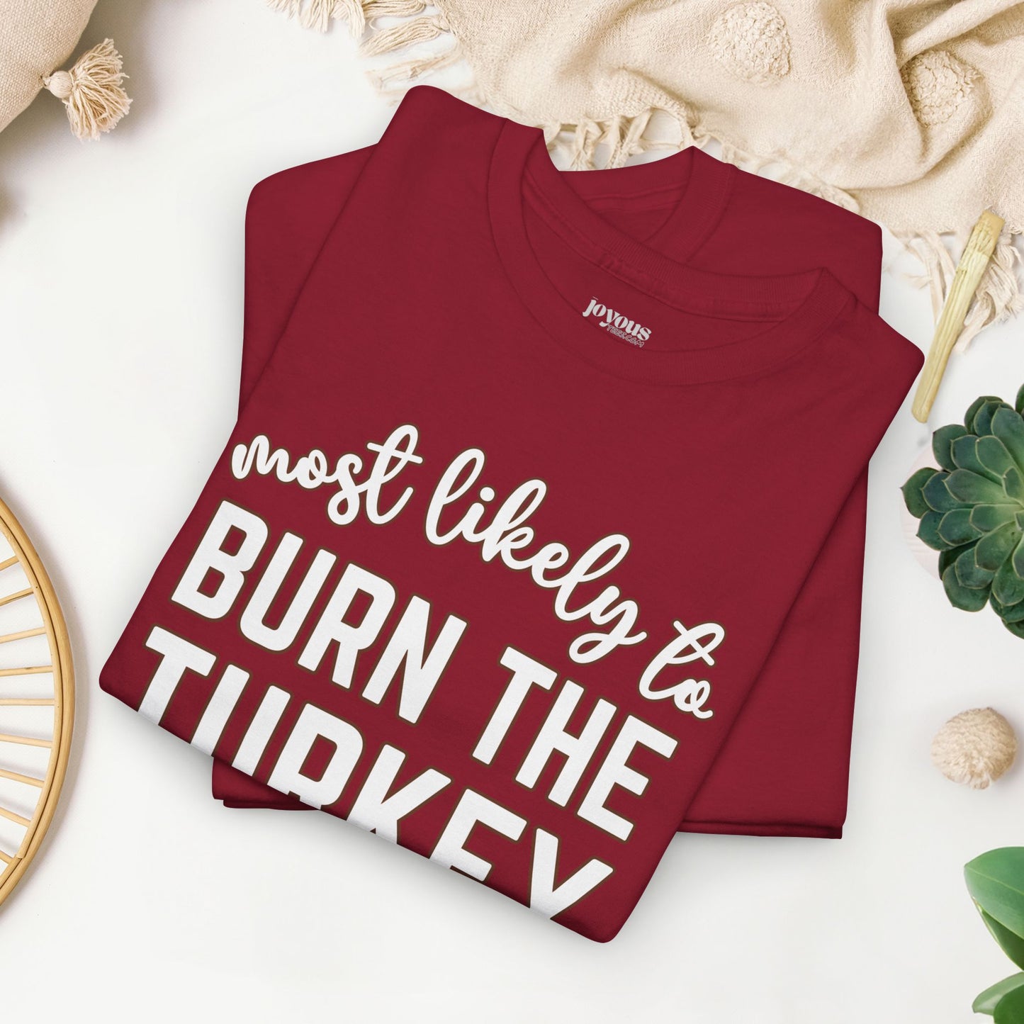 Funny Thanksgiving Shirt - Most likely to Burn the Turkey Heavy Cotton Tee