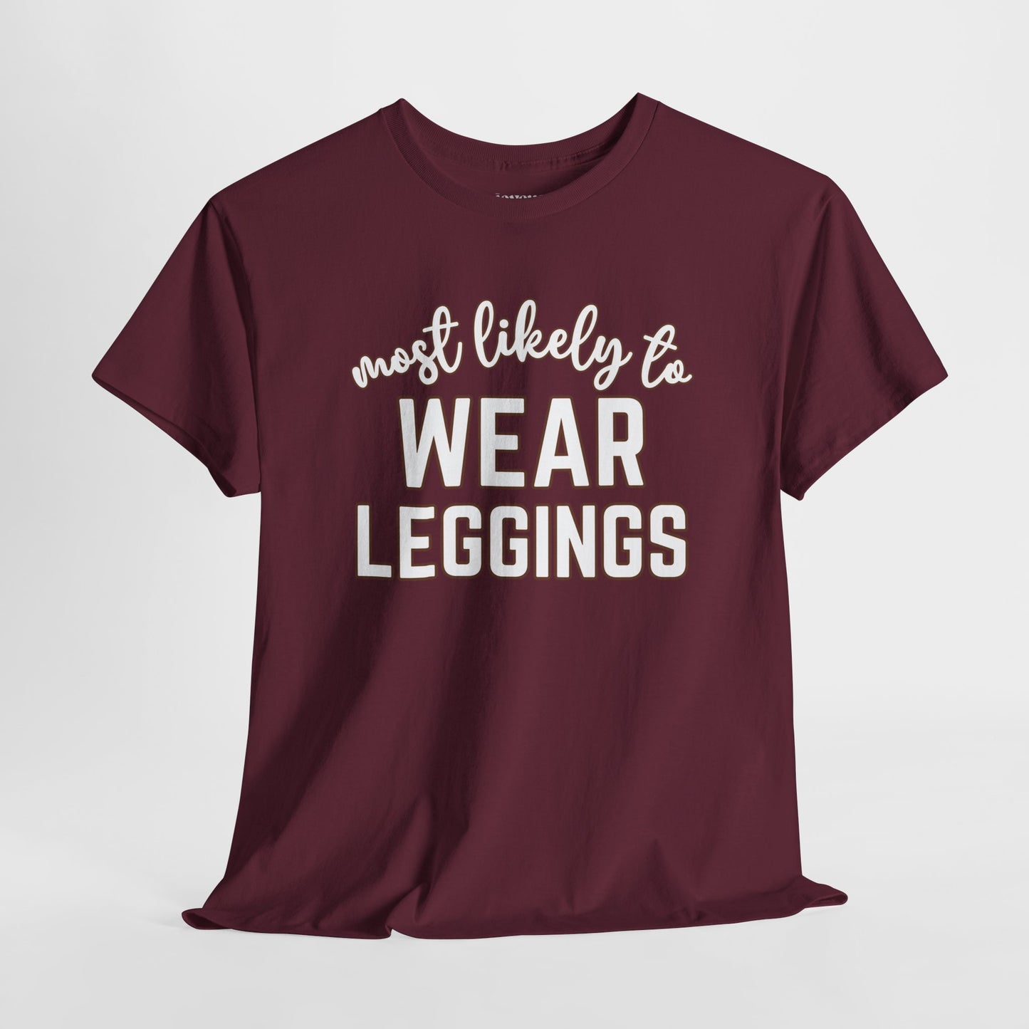 Funny Thanksgiving Shirt - Most Likely To Wear Leggings Heavy Cotton Tee