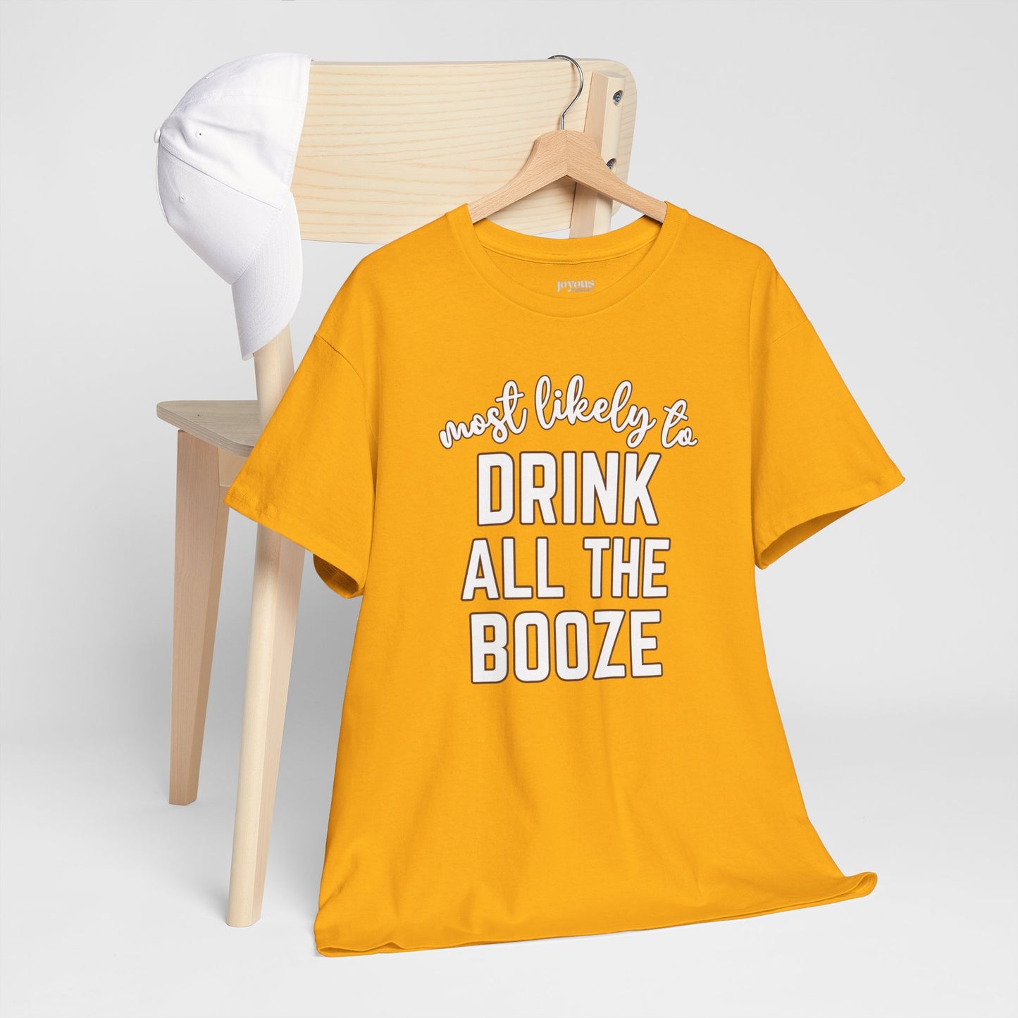 Funny Thanksgiving Shirt - Most Likely to Drink All The Booze Heavy Cotton Tee