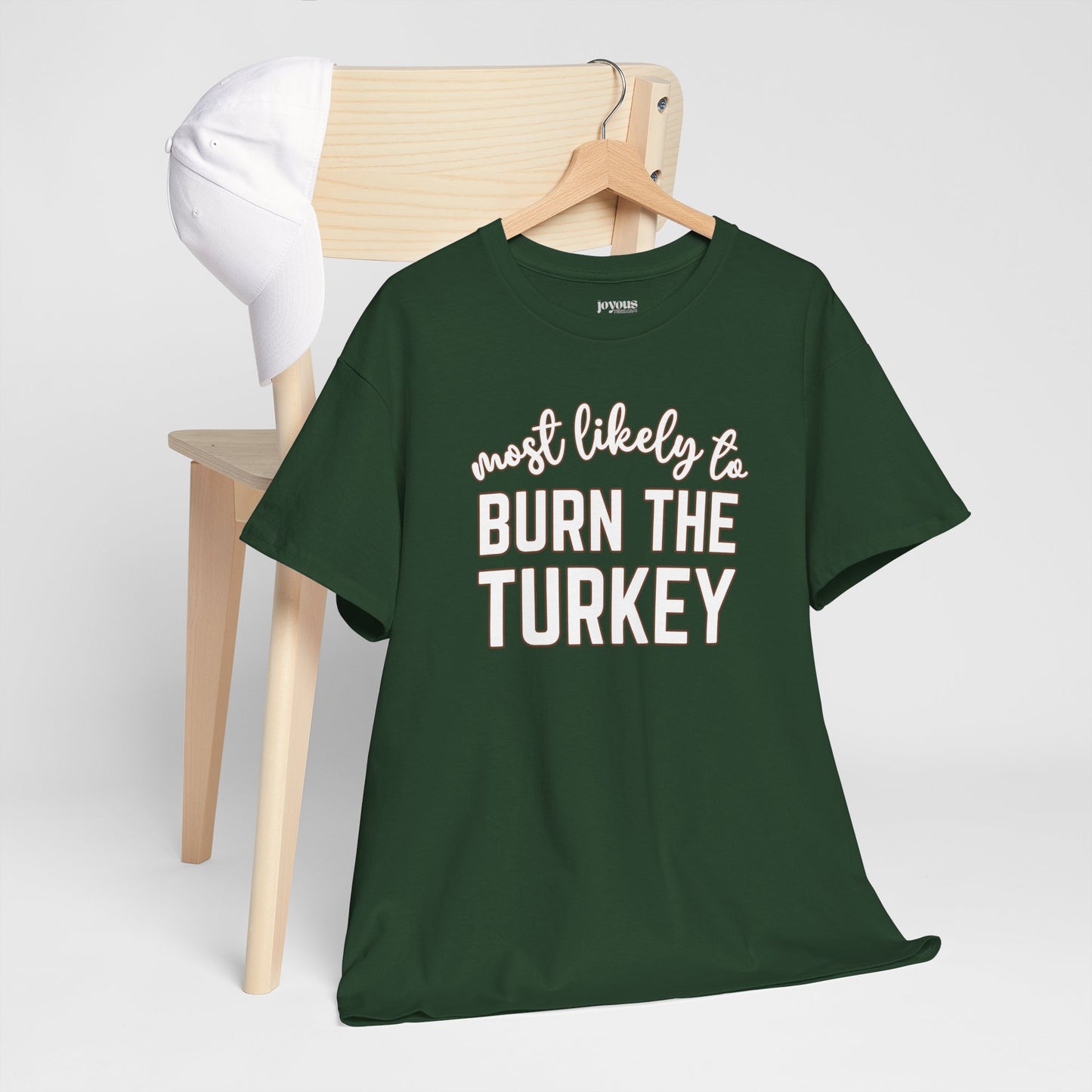 Funny Thanksgiving Shirt - Most likely to Burn the Turkey Heavy Cotton Tee