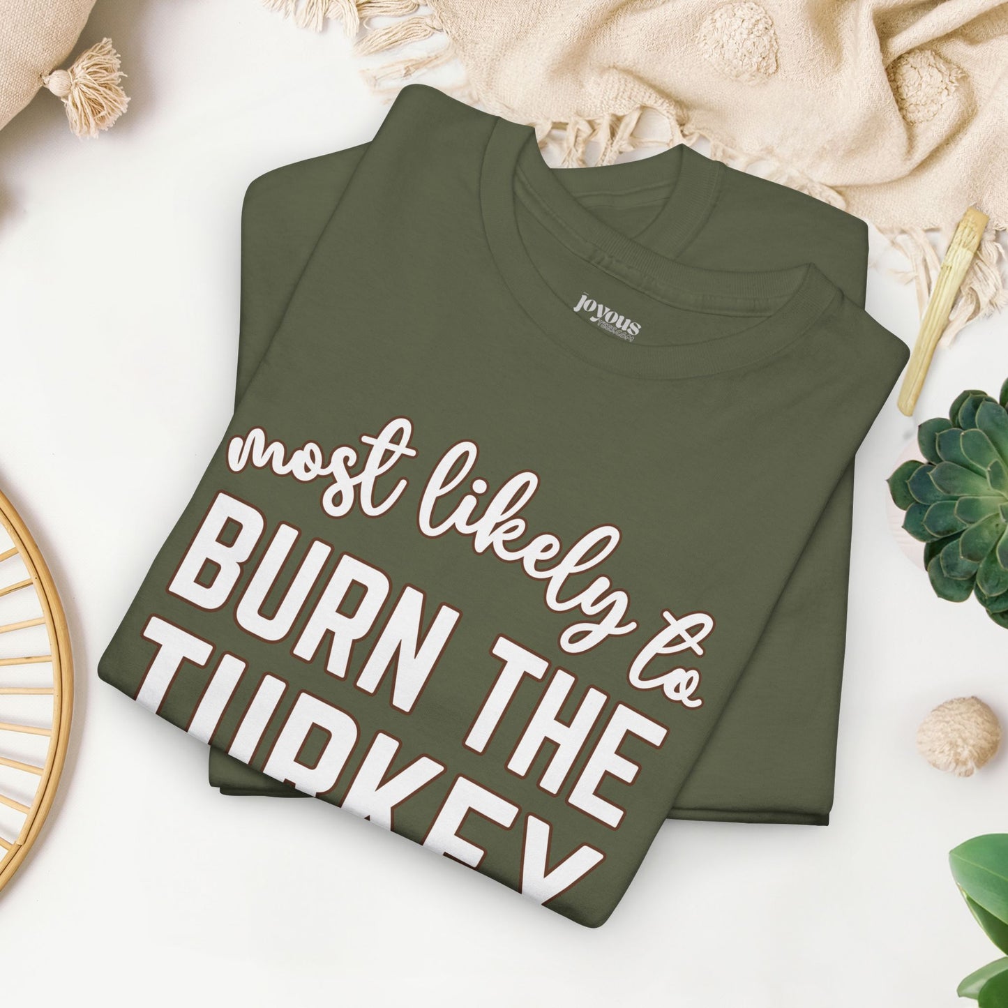 Funny Thanksgiving Shirt - Most likely to Burn the Turkey Heavy Cotton Tee