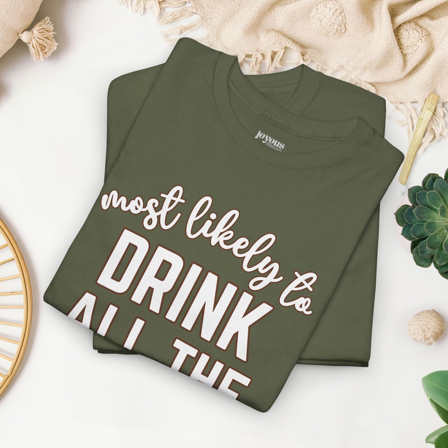 Funny Thanksgiving Shirt - Most Likely to Drink All The Booze Heavy Cotton Tee