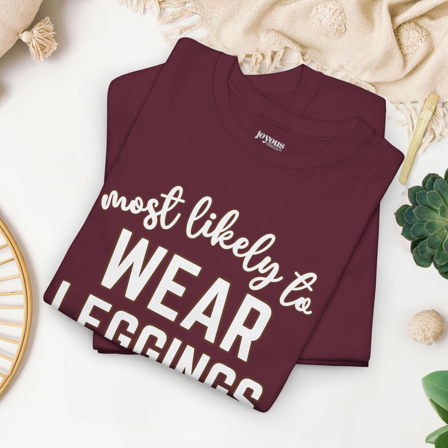 Funny Thanksgiving Shirt - Most Likely To Wear Leggings Heavy Cotton Tee