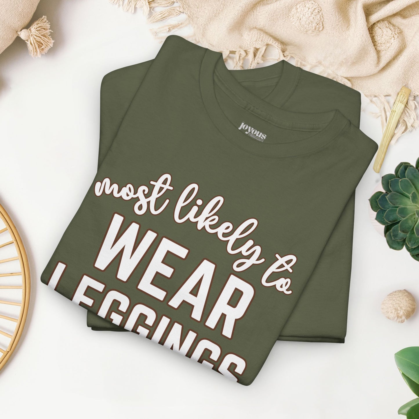 Funny Thanksgiving Shirt - Most Likely To Wear Leggings Heavy Cotton Tee