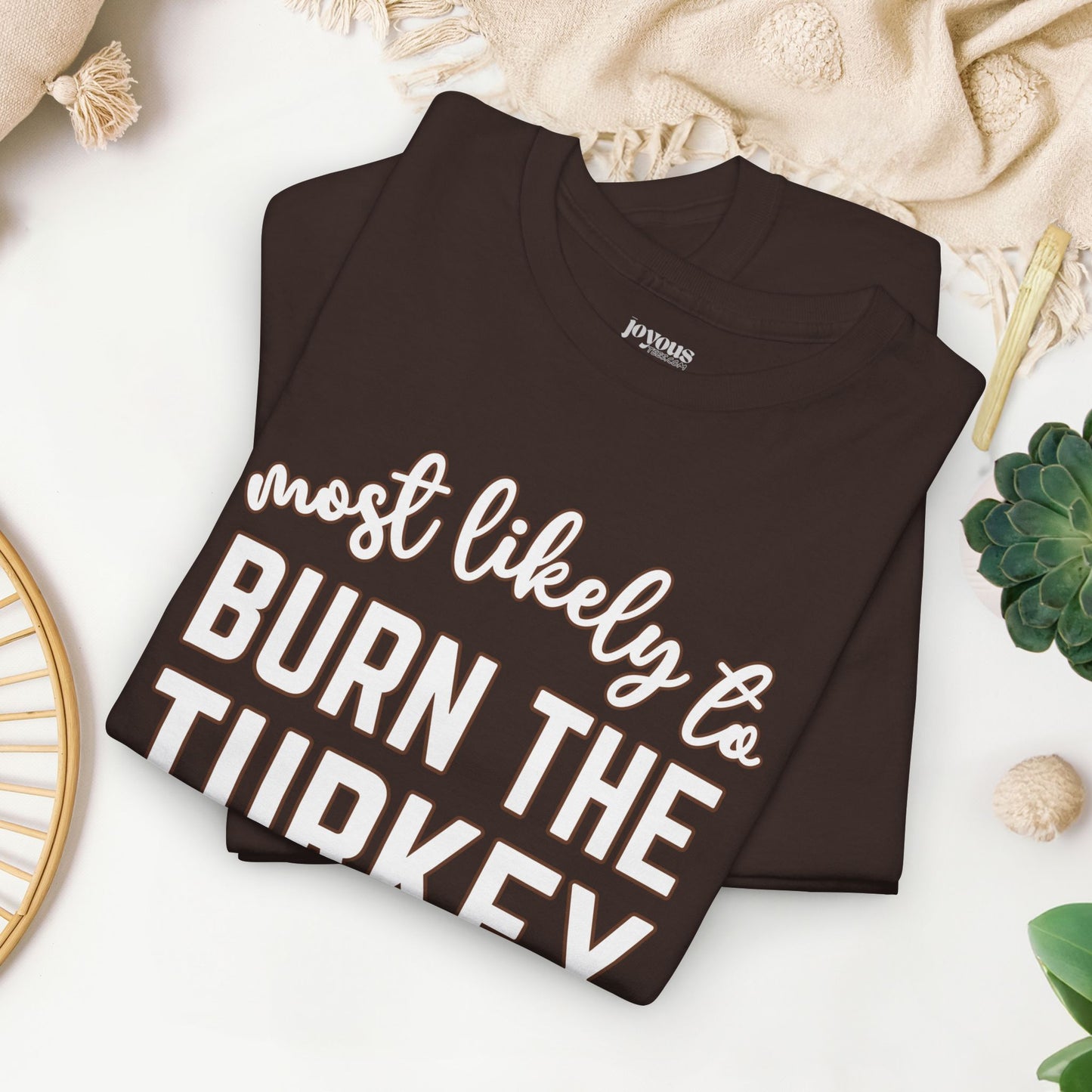 Funny Thanksgiving Shirt - Most likely to Burn the Turkey Heavy Cotton Tee