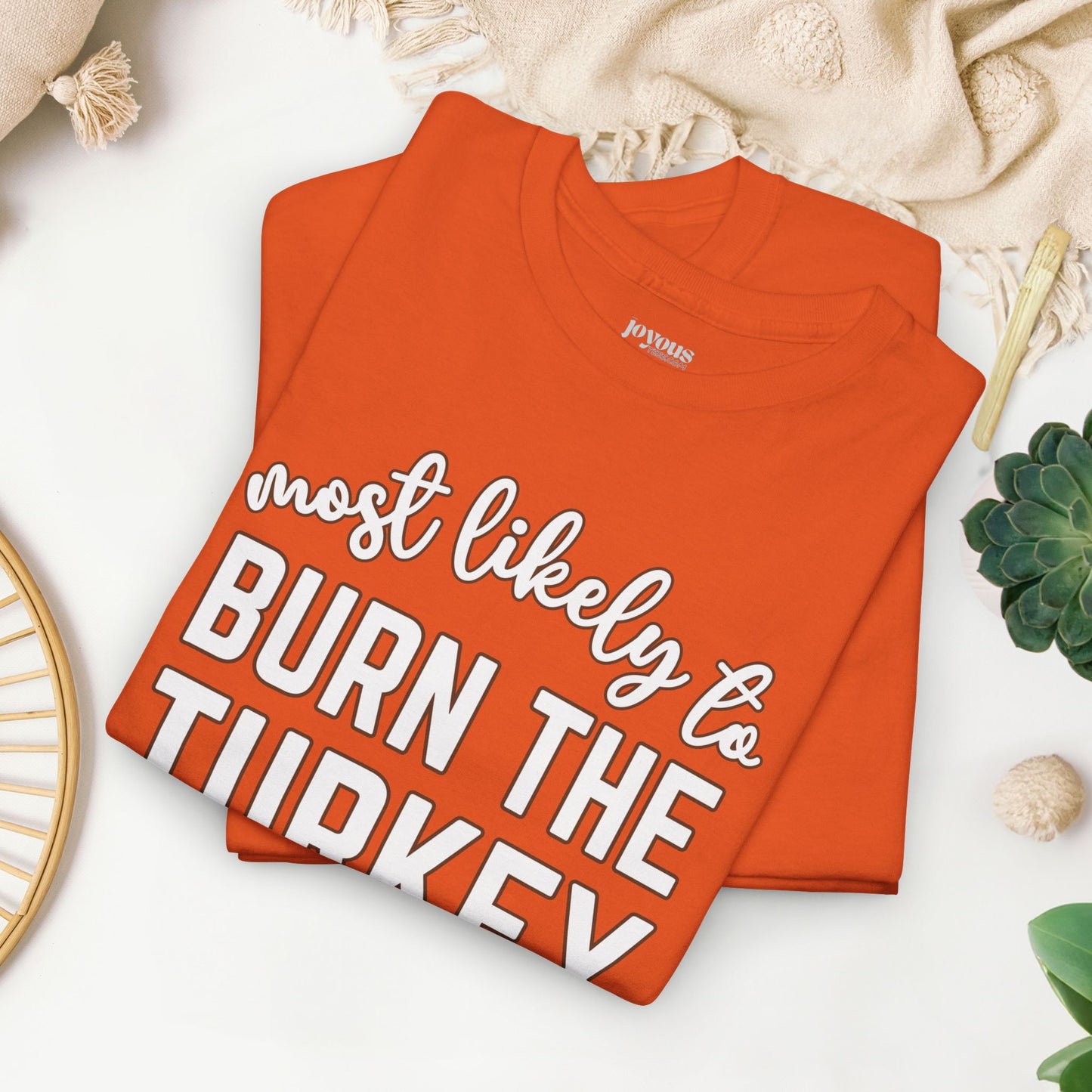 Funny Thanksgiving Shirt - Most likely to Burn the Turkey Heavy Cotton Tee